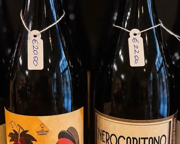 Sicilian bottles on the shelf at Divino