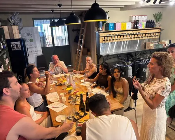 Guests at the long table during a tasting